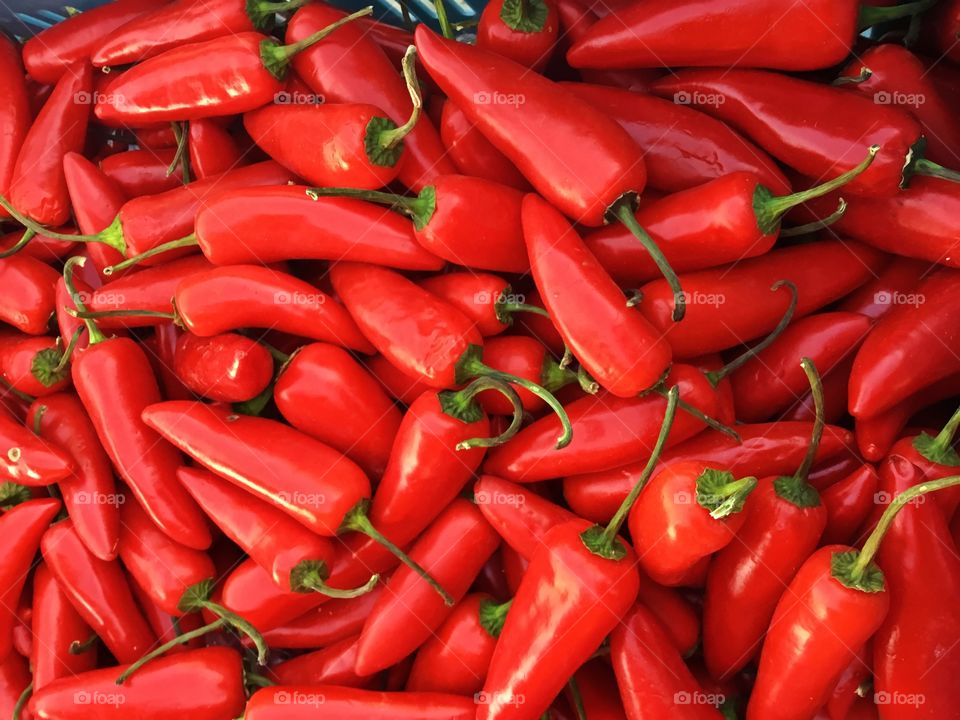 Spicy red peppers - Red appeals to our taste buds too, with foods like strawberries, apples, cherries, tomatoes and peppers all colored by forms of carotenoids – vibrant red pigments that assist photosynthesis