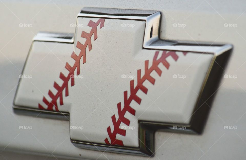 Chevy emblem with baseball vinyl wrap. 