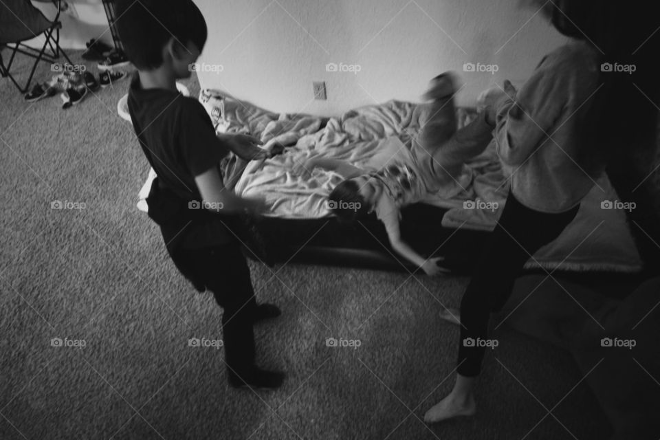 cousins playing inside