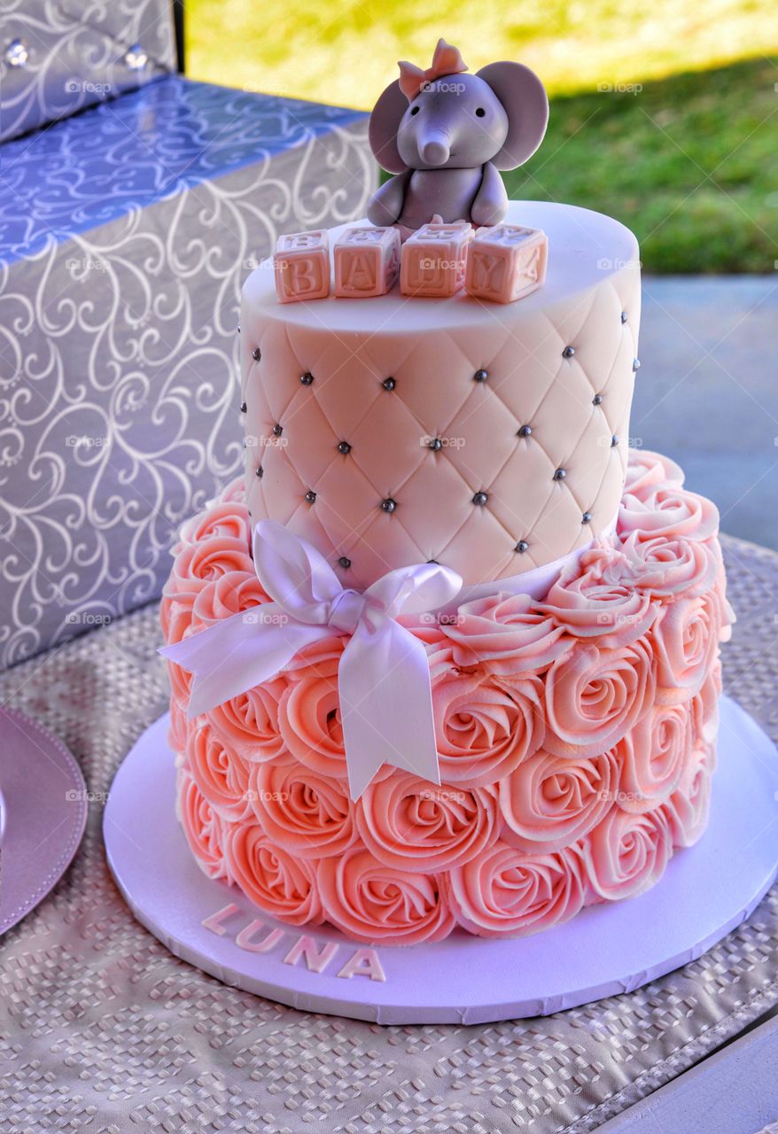 Cute and decorative baby shower faker with elephant on top 