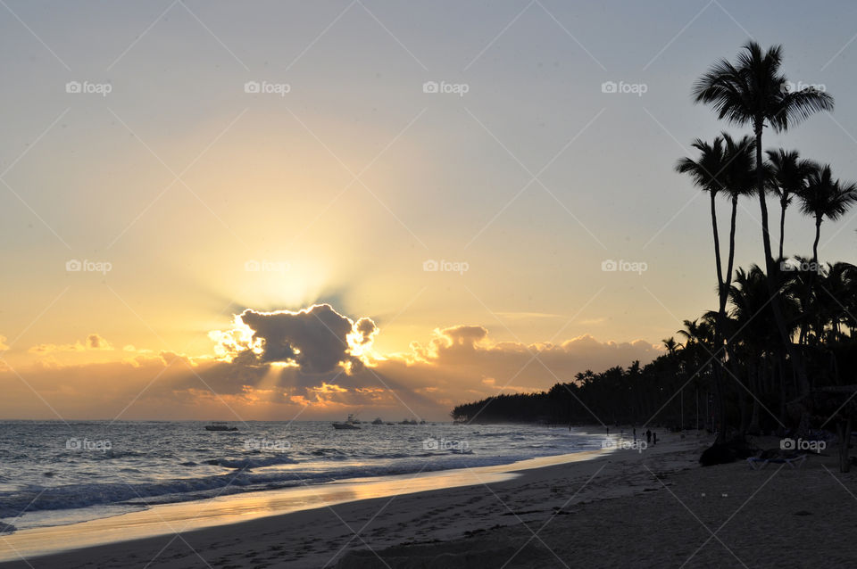 sun behind the clouds