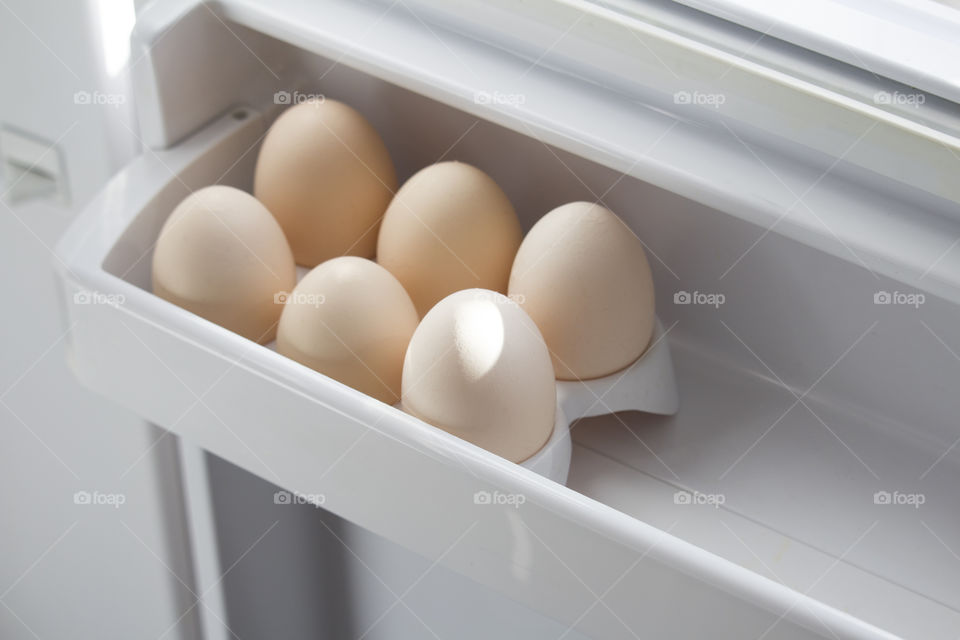 eggs in the fridge . 
proper egg storage concept
