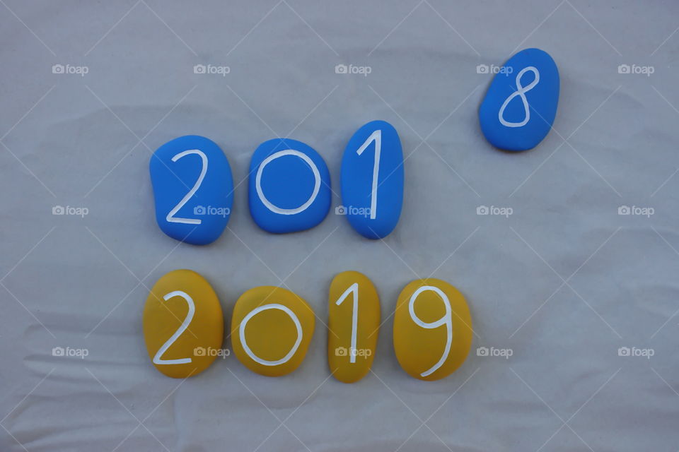 Bye 2018, Welcome 2019 with blue and yellow colored stones