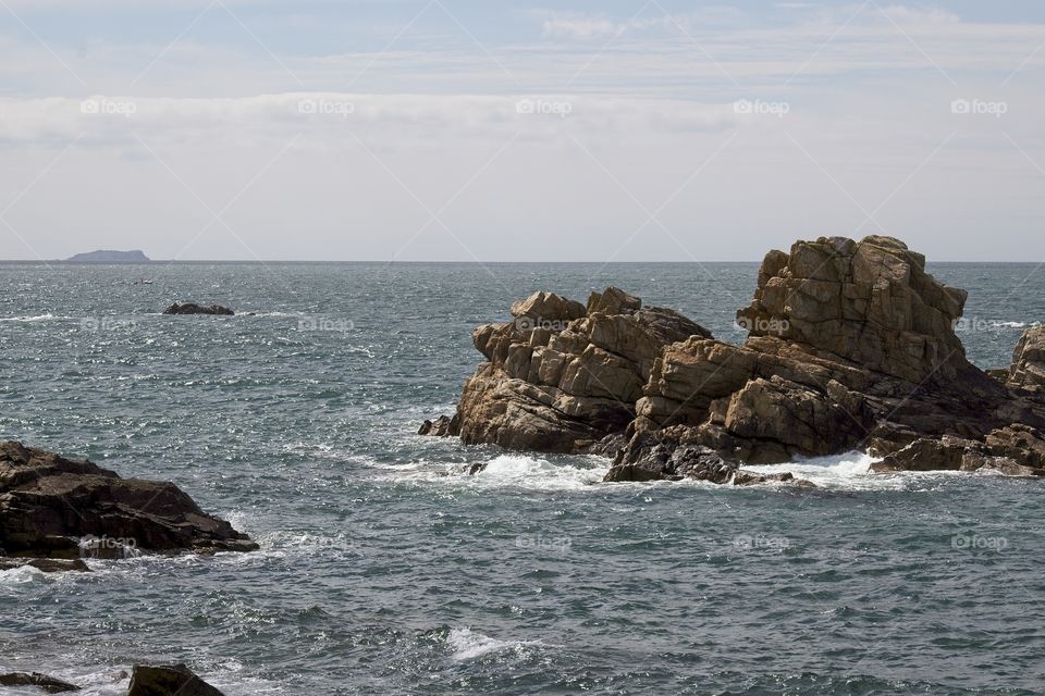 water flowing into the rocks