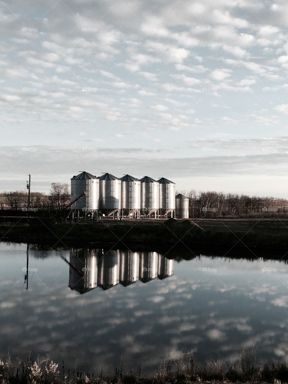 Steel grain bin reflection 