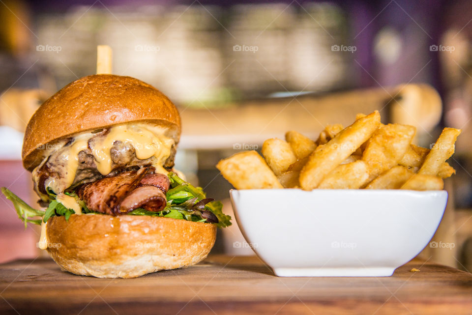 Close-up of burger with french fries