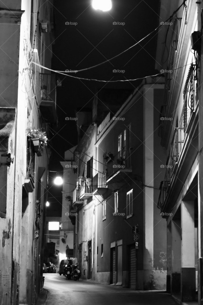 In Italy narrow street lid up 