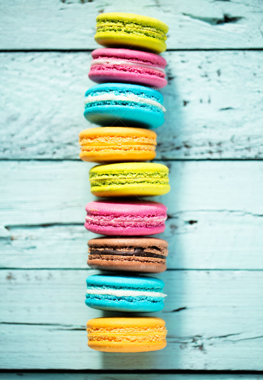 Arrangement of macaroon on wood