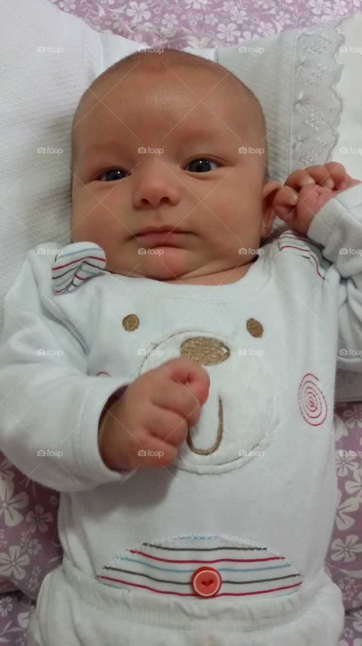 baby grimacing with hunger