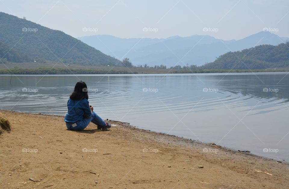 Sitting at Reed Lake in Chin State of Burma
