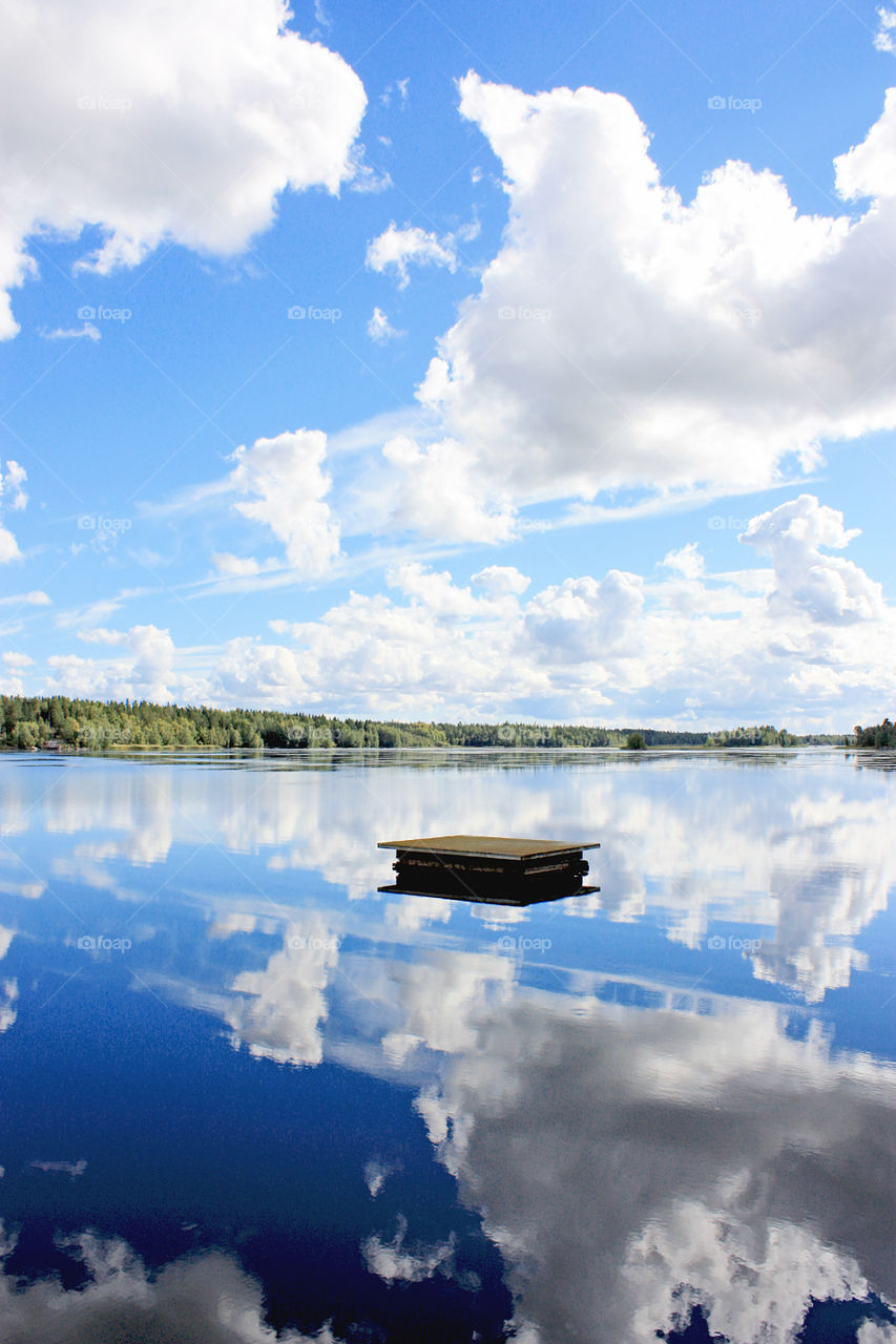 Clouds reflected on idyllic lake