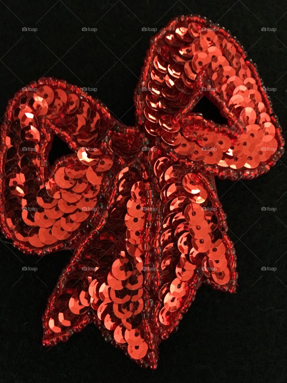 Red sequin bow