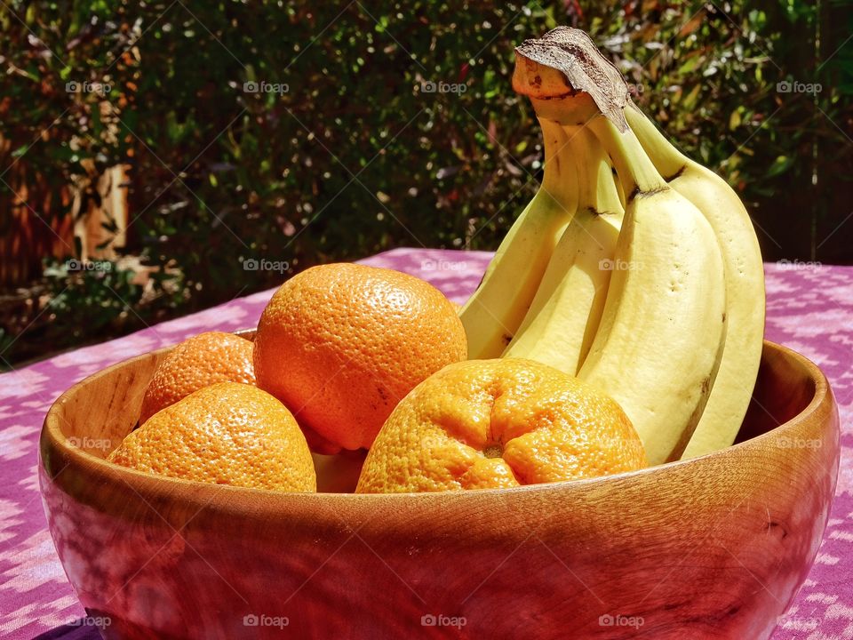 Fresh Fruit Bowl. Fresh Oranges And Bananas For A Picnic
