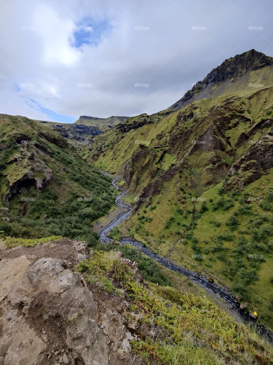 Green canyon with mountain stream during hiking trip in Iceland #nofilter #noedit