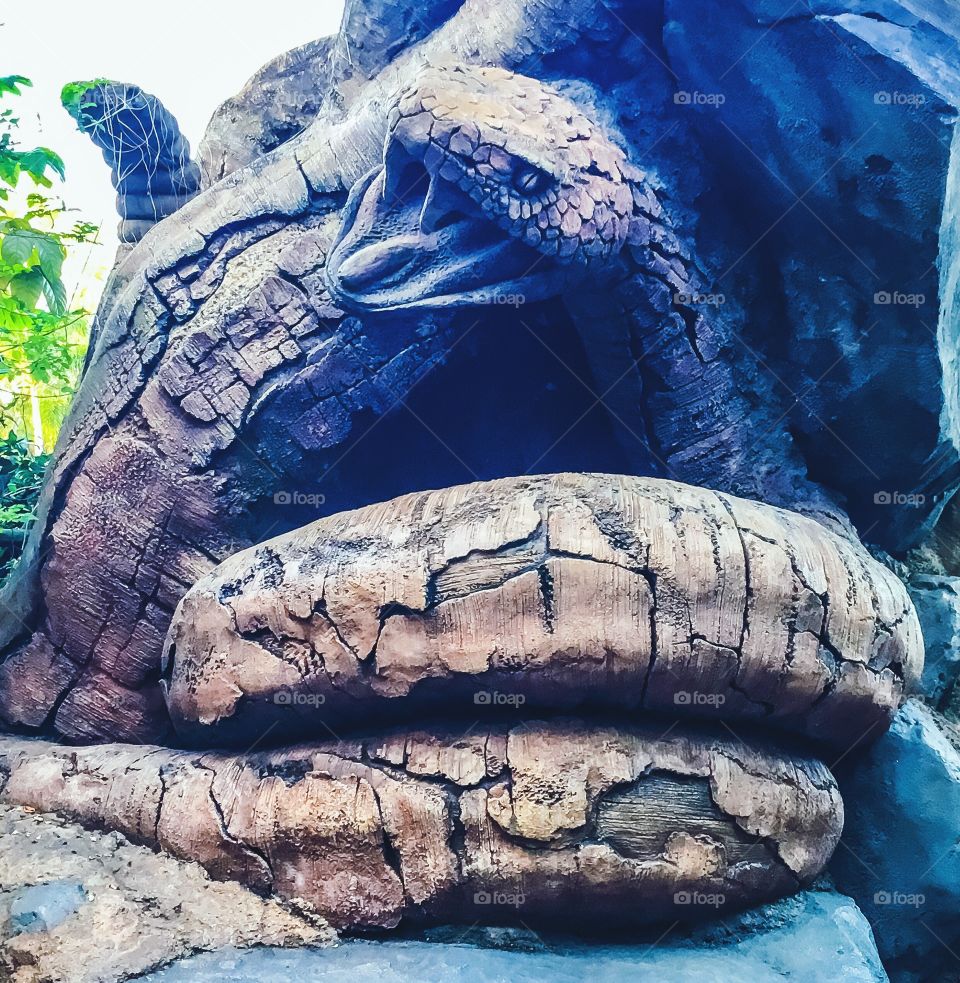 A carved rattlesnake in the Tree of Life in Animal Kingdom.  All cooked up and ready to pounce!