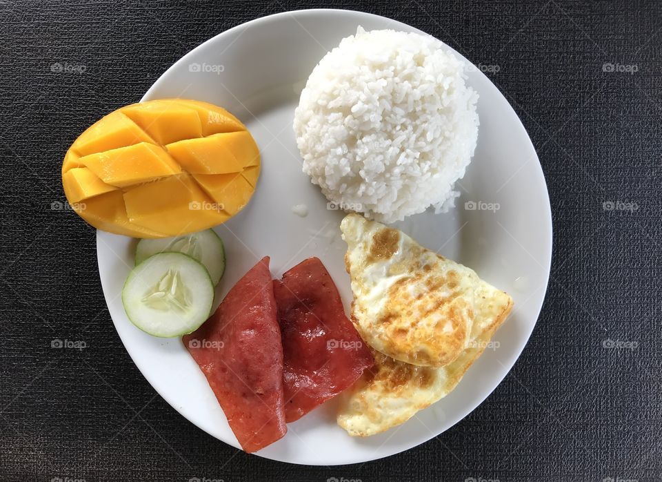 Complete Filipino ham and egg breakfast set.