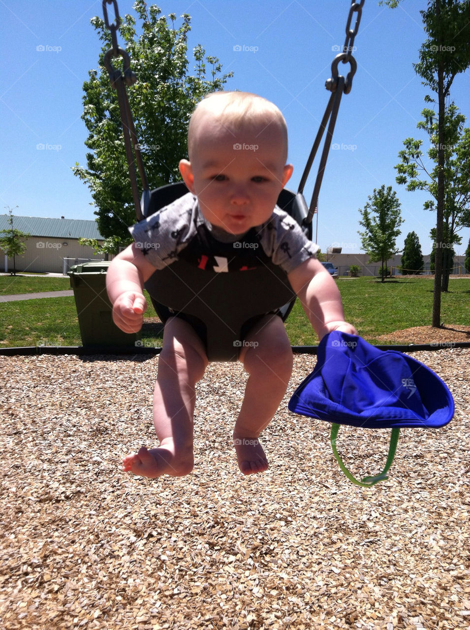 Baby boy swinging