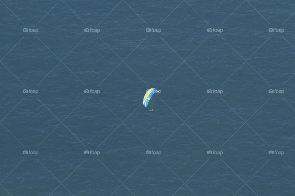 Paraglider flying.