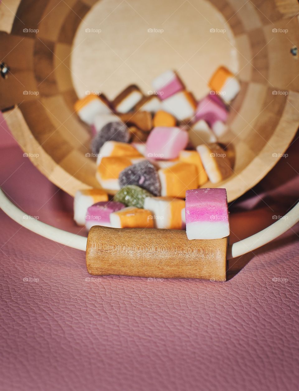 Colorful candys in wooden box