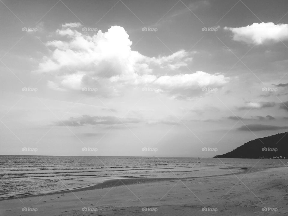 Scenic view of beach against  sky : black and white shot