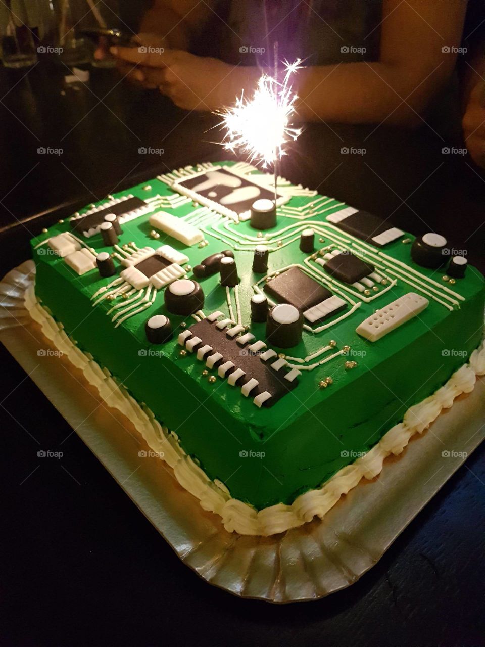 Birthday cake with electronic theme.