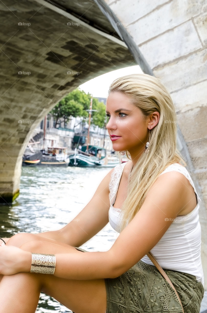 Side view of stylish woman smiling