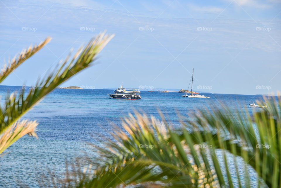 Sea with boats in ibiza