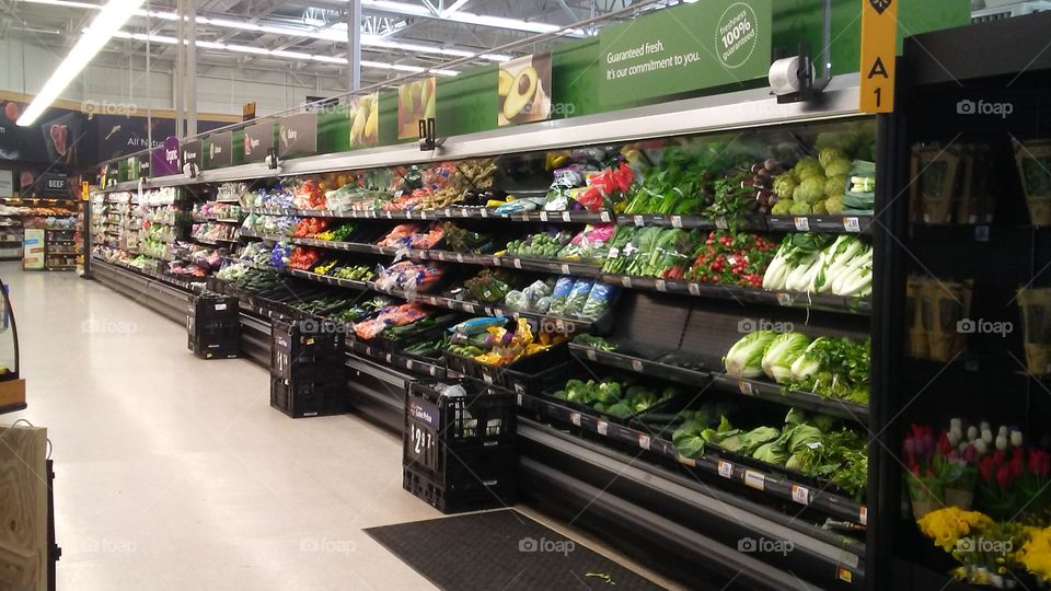 produce aisle in supermarket