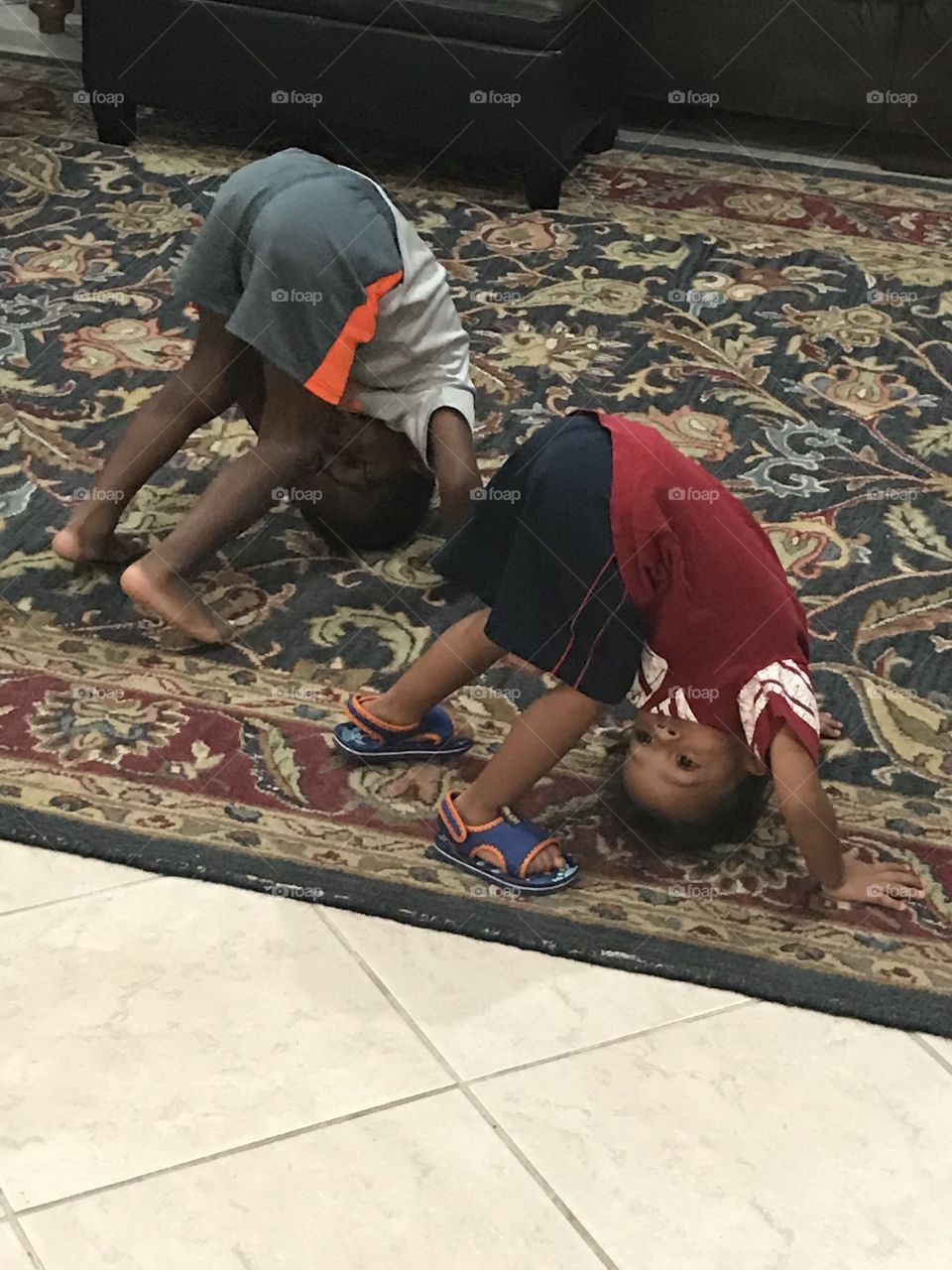 These two cute toddler boys love showing their Mommy their cool yoga moves!