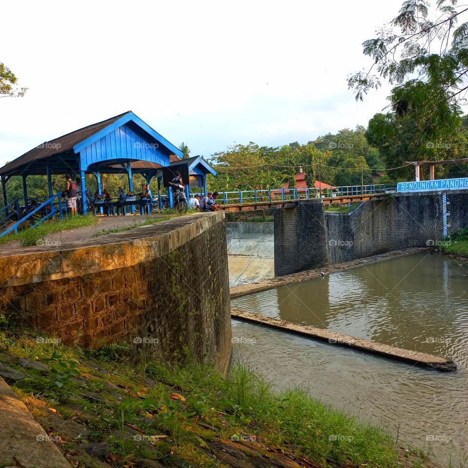 River dam connecting between villages