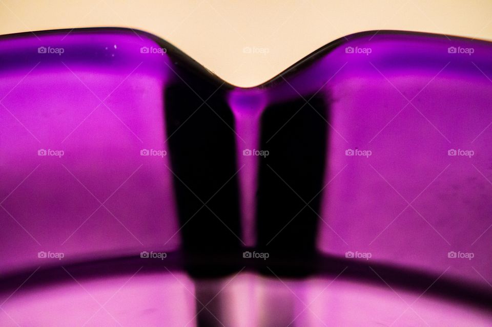 Close-up of purple eyeglasses