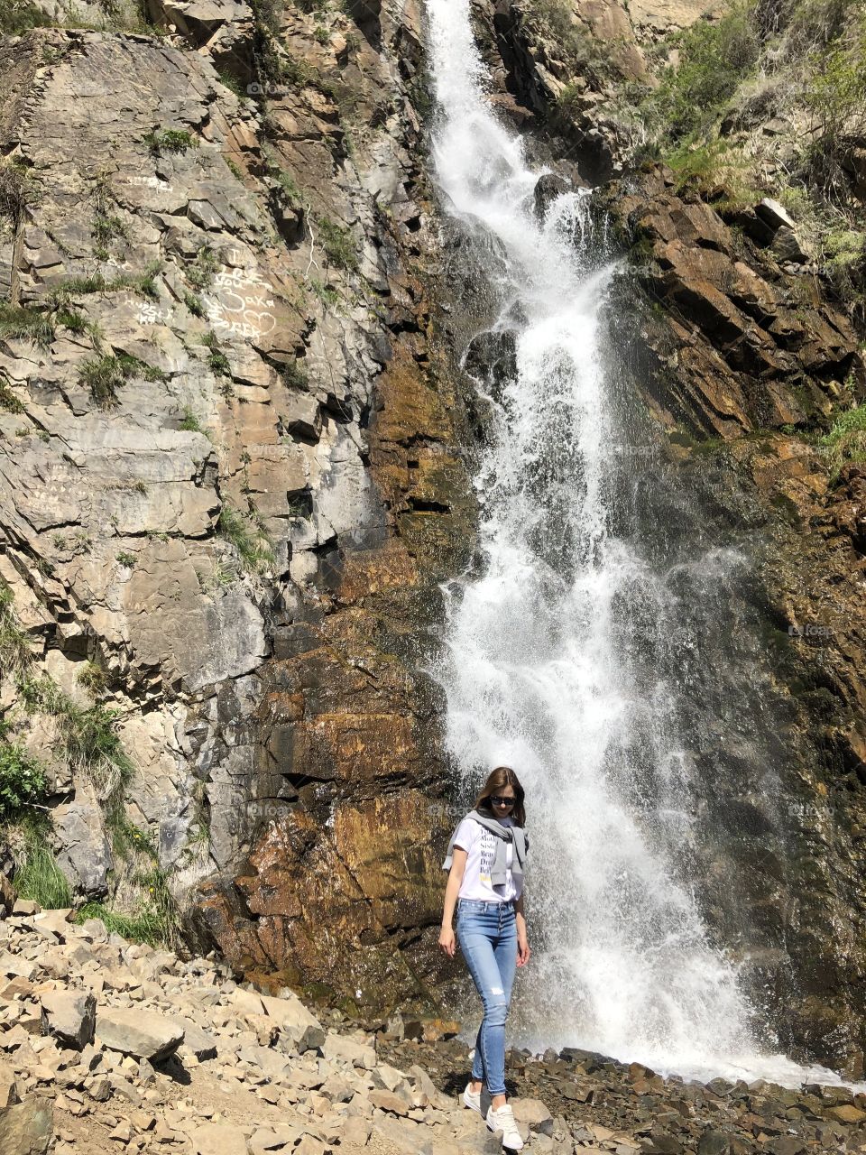 Girl at the waterfall