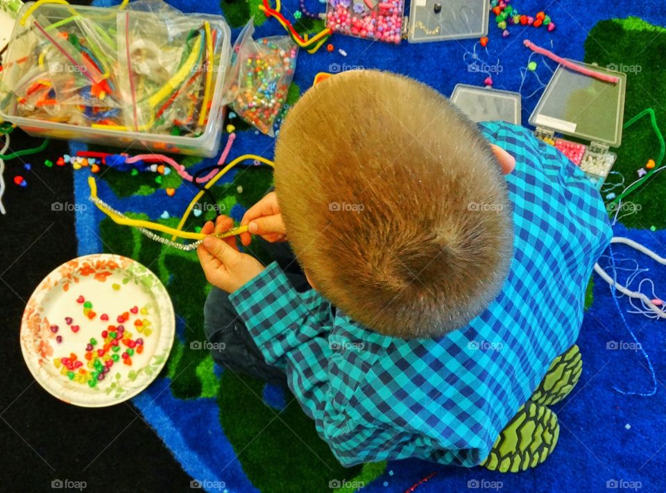 Boy Making Arts And Crafts
