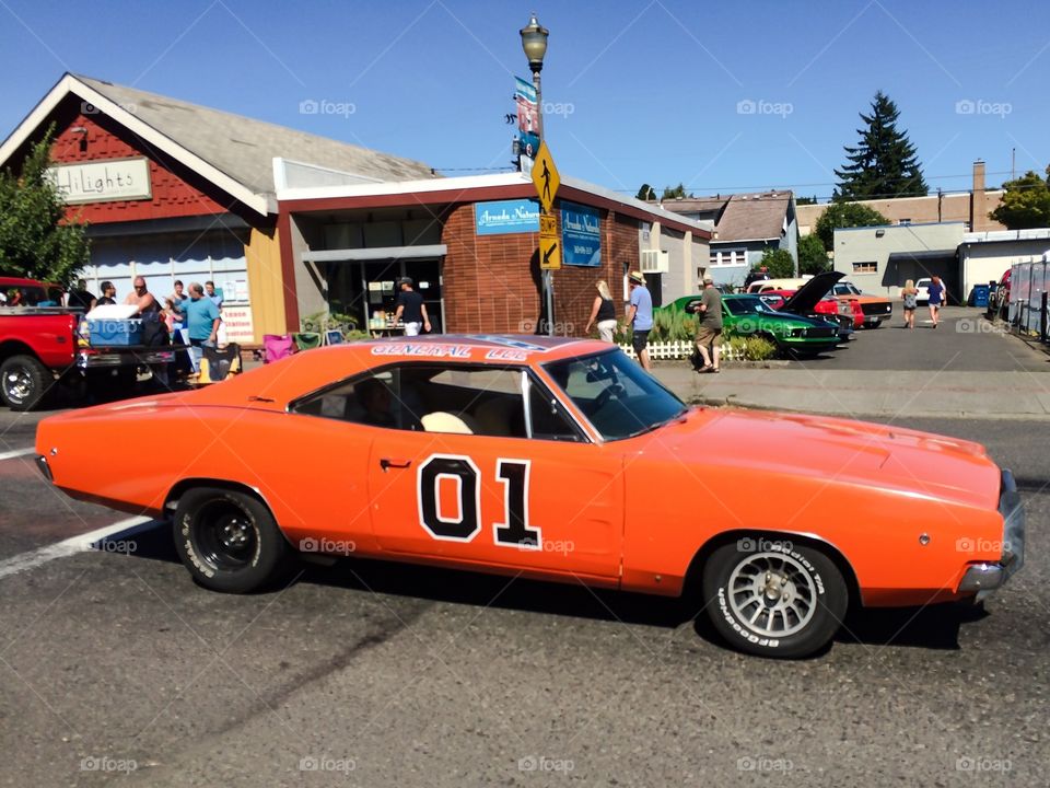 General Lee. Classic sports car displays controversial topic on rooftop