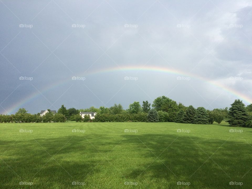 Rainbow. Full rainbow after the sudden storm