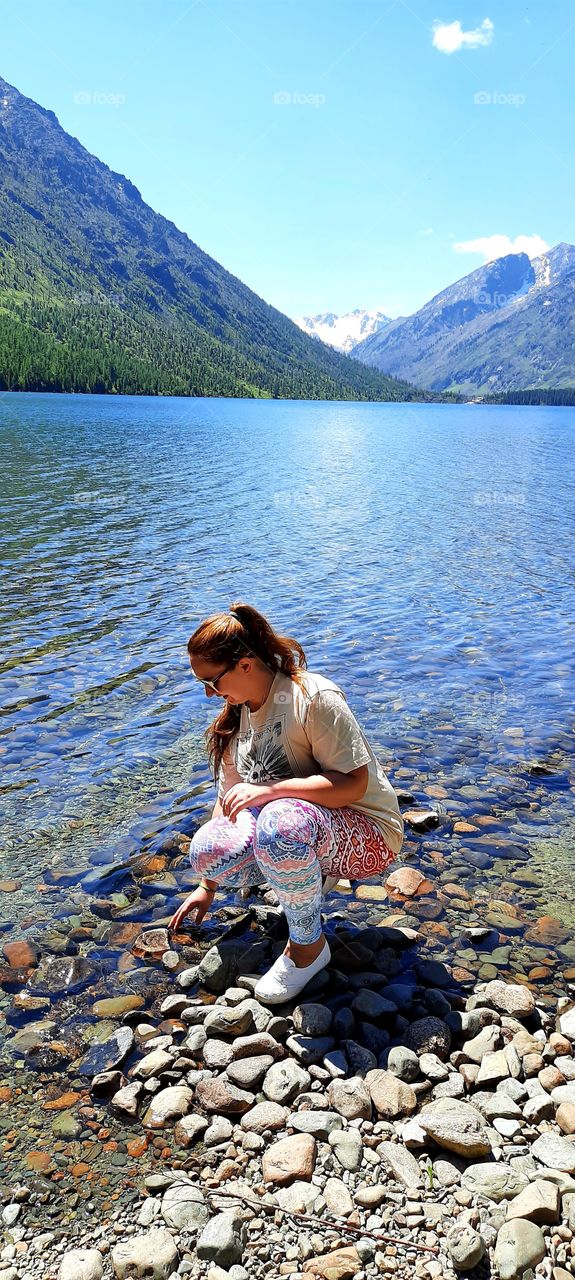 Girl on the lake.  For editorial use.