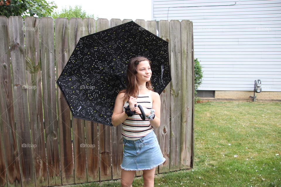 Girl with Totes umbrella