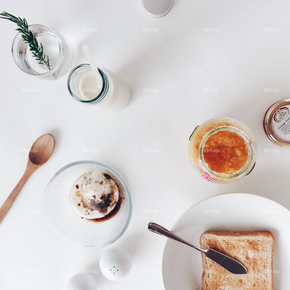 High angle view of bread with butter knife