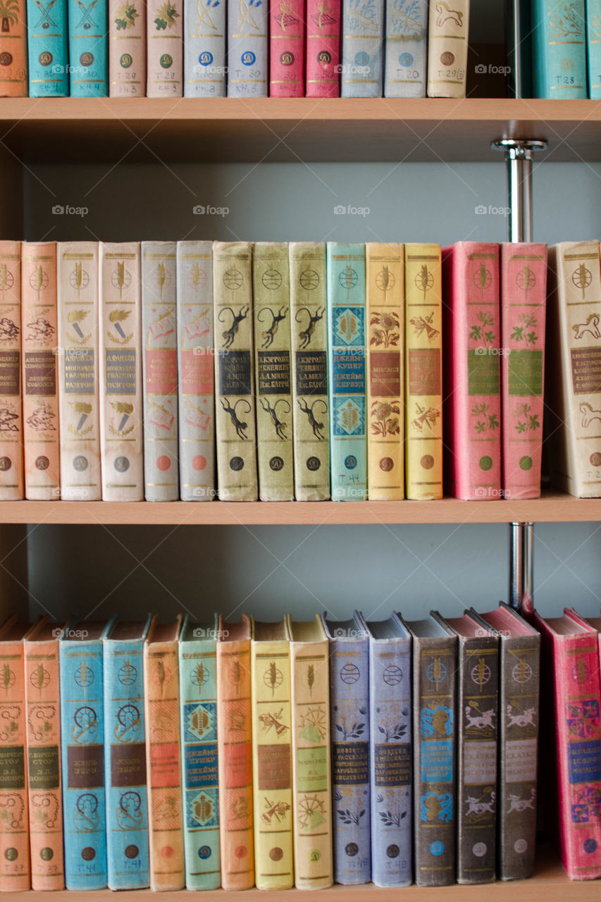 books on a shelf in the library