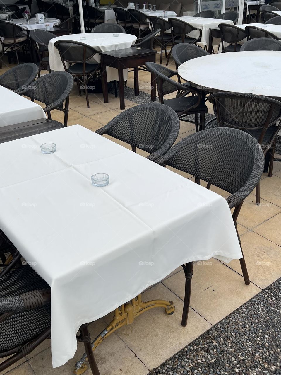 Empty seats in an outside street cafe 