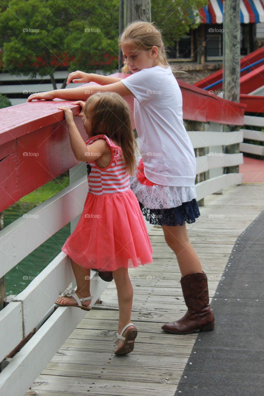 I'm a big girl, too. Girls on a bridge