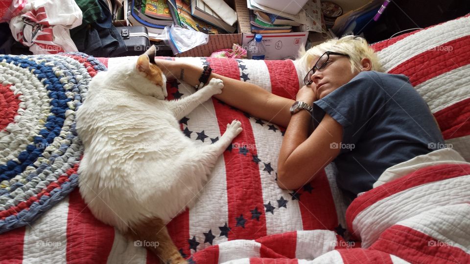 Kitty Love. My beautiful cat Marilyn Monroe, was diagnosed with kidney disease. I took this photo of her Mom and Marilyn reaching for one another.