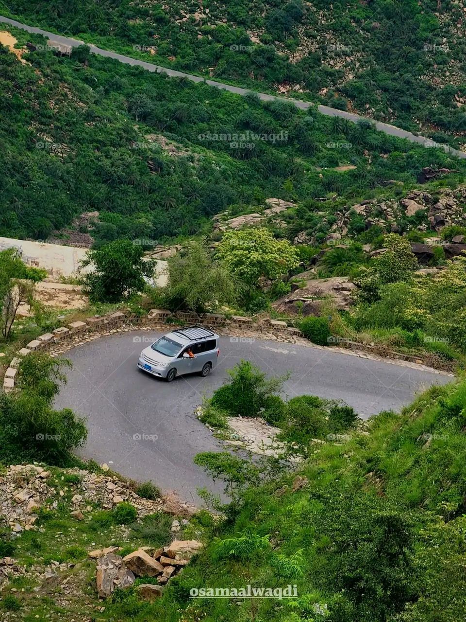 Glory be to God, the magnificent and picturesque view and the natural green trees are a view that is nothing more wonderful than it