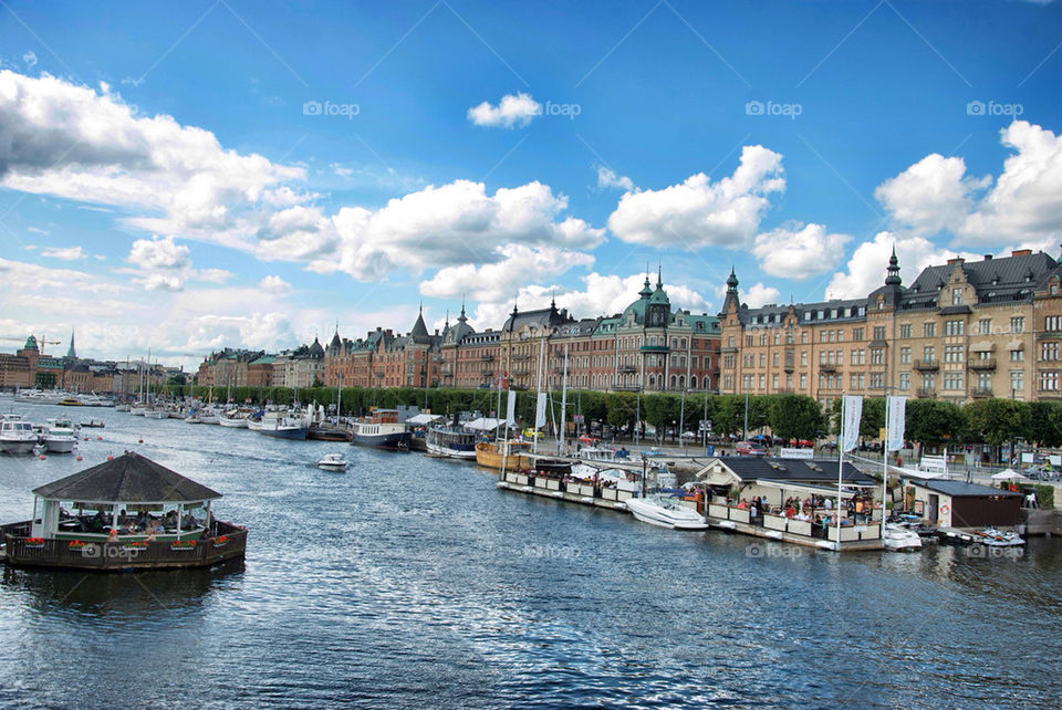 city stockholm boats river by serbachs
