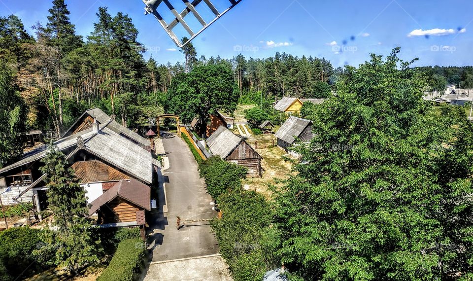 Panorama from a mill in a wooden sculpture town (Lithuania, Druskininkai, July, 2019).