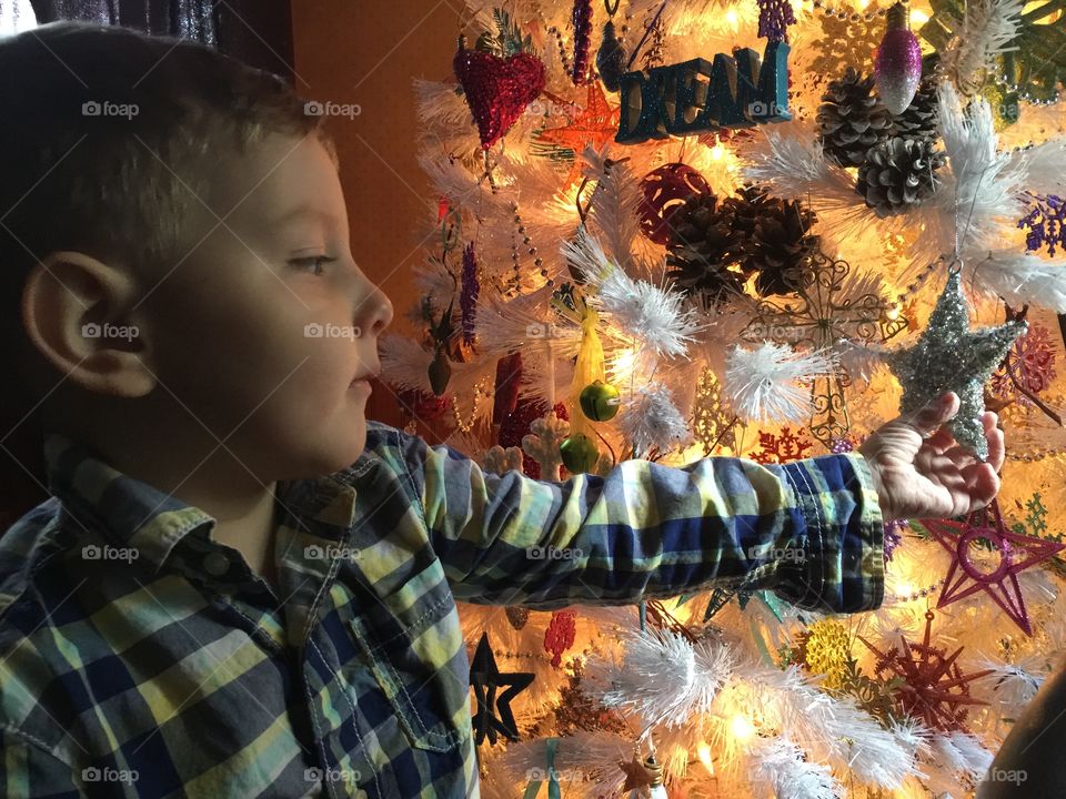 Mason helping us decorate the Christmas tree