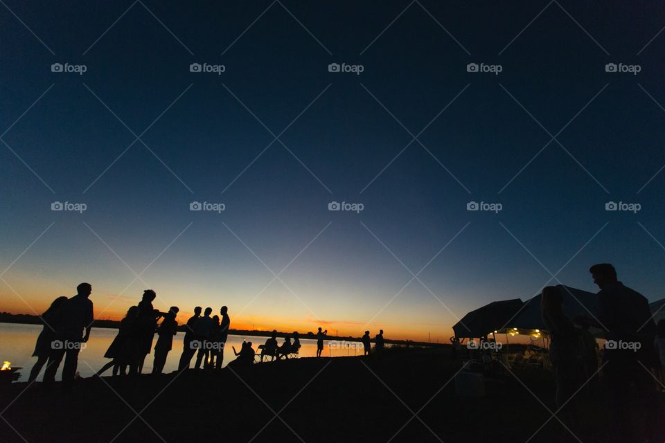 People on the beach silhouette 