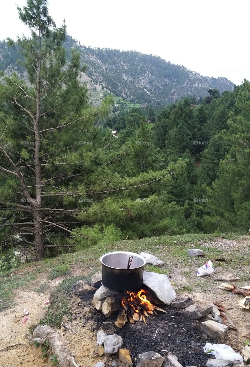 enjoy in mountain cooking food in desi