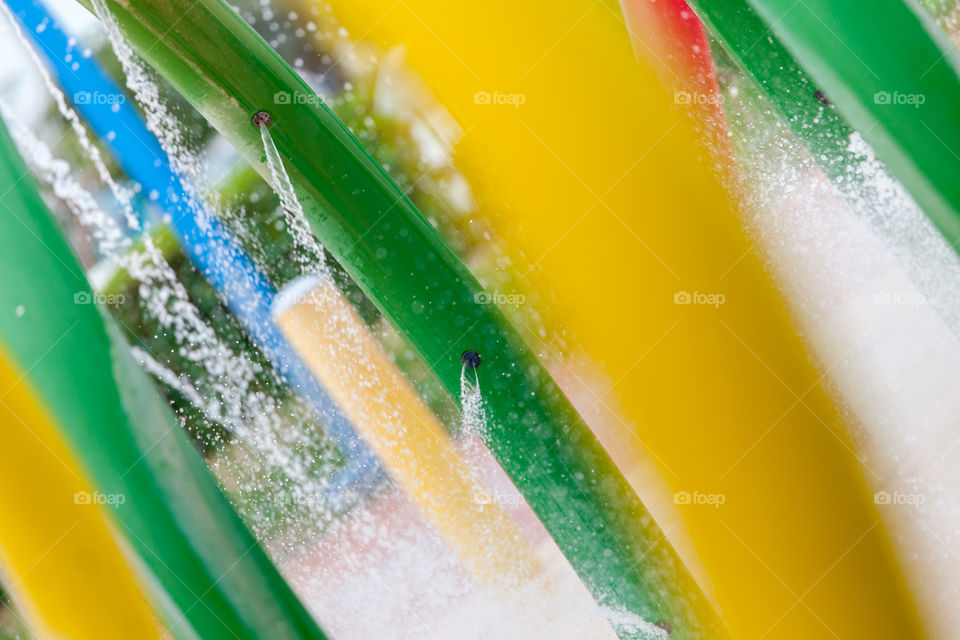 Colorful children's playground featuring water