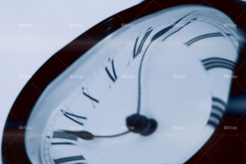 Time Warp. Image of clock used Roman numerals.